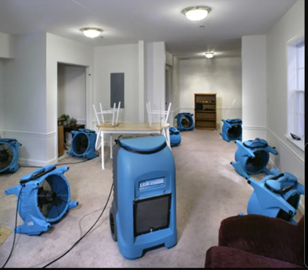 Air movers and dehumidifier setup for Water Damage Restoration in Bernards